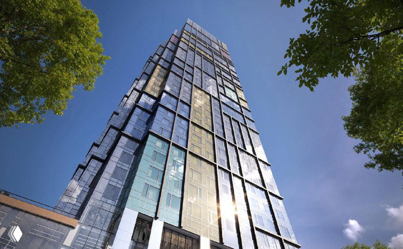 Высотный стеклянный корпус проекта: визуализация высокого блока с современной фасадной отделкой и вертикальными акцентами.