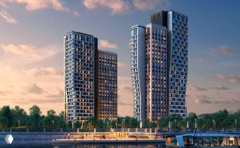 Комплексный рендер вечернего вида ЖК U2 с подсветкой, набережной и прогулочной зоной — общий вид комплекса и его окружение у воды.