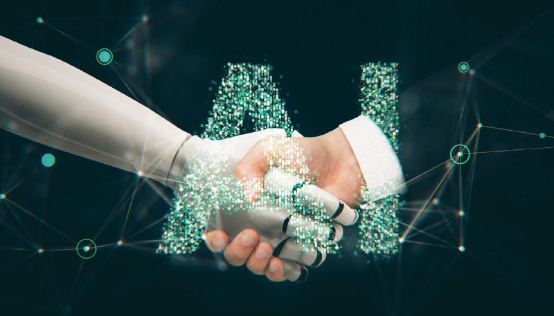 Рукопожатие человека и робота на тёмном фоне с цифровыми узлами и частиц — иллюстрация сотрудничества человека и ИИ.