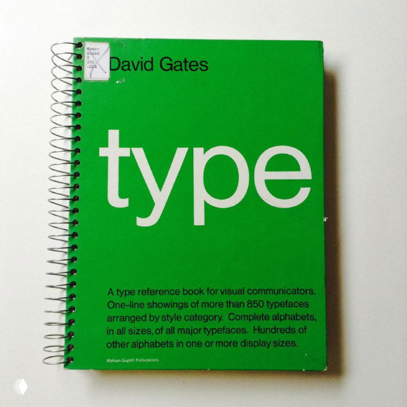 Фотография обложки зелёной книги с крупным белым словом «type», подписью David Gates и пружинным переплётом на белом фоне.