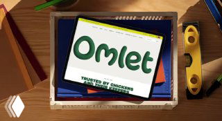 Скриншот или макет сайта Omlet на планшете: логотип, верстка страницы и визуальные элементы бренда, демонстрация веб‑части айдентики в кампании