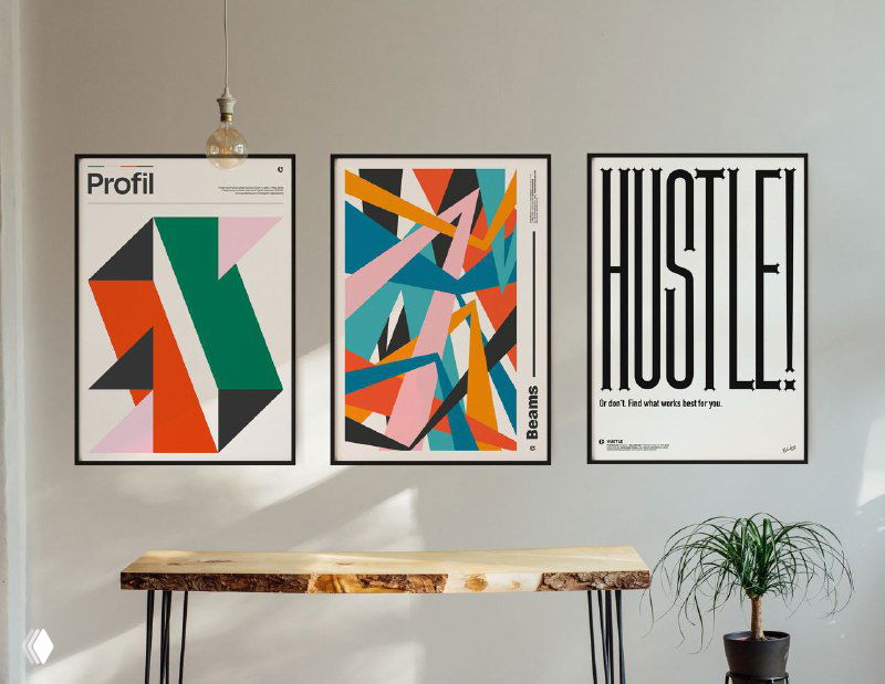 Три плаката Вратислава Пецки в черных рамках над консолью: абстрактные формы, типографика и минималистичная композиция.