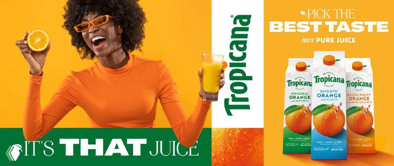 Яркое рекламное изображение с человеком в оранжевой одежде, стаканом сока и упаковками Tropicana на бело-оранжевом фоне, передающее настроение кампании.