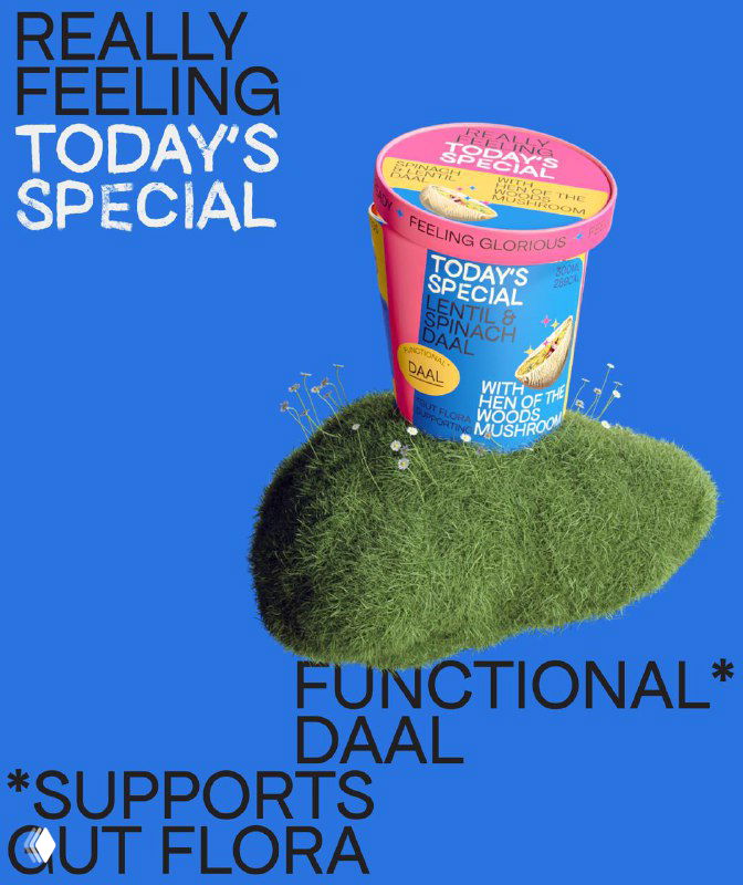 Макет упаковки на синем фоне: стаканчик «Today’s special» на искусственном холмике с типографическим текстом «Really feeling» и декоративными элементами.