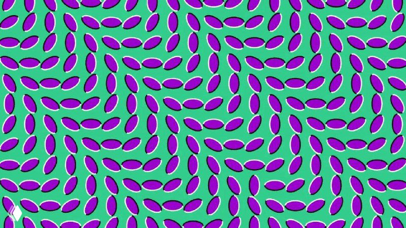 Статичная картинка оптической иллюзии: повторяющийся узор фиолетовых «листиков» на зелёном фоне, создающий эффект движения.