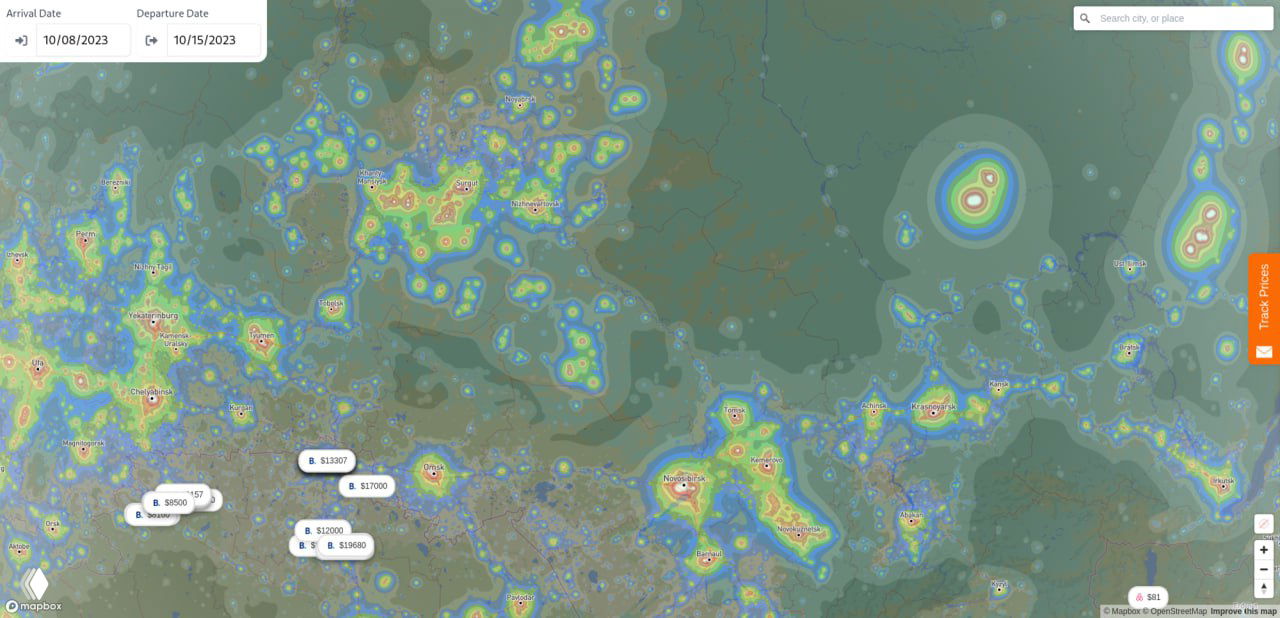 Региональный фрагмент карты с переменной плотностью света: видны локальные точки, дороги и населённые пункты на фоне цветовой шкалы.