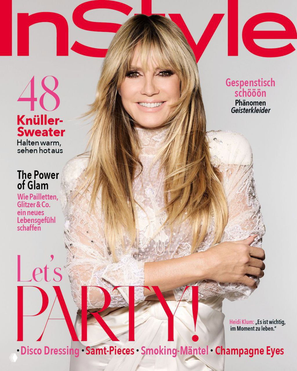 Портретная фотография для журнала: улыбающаяся женщина в светлом кружевном платье на фоне обложки с логотипом InStyle, студийный кадр.