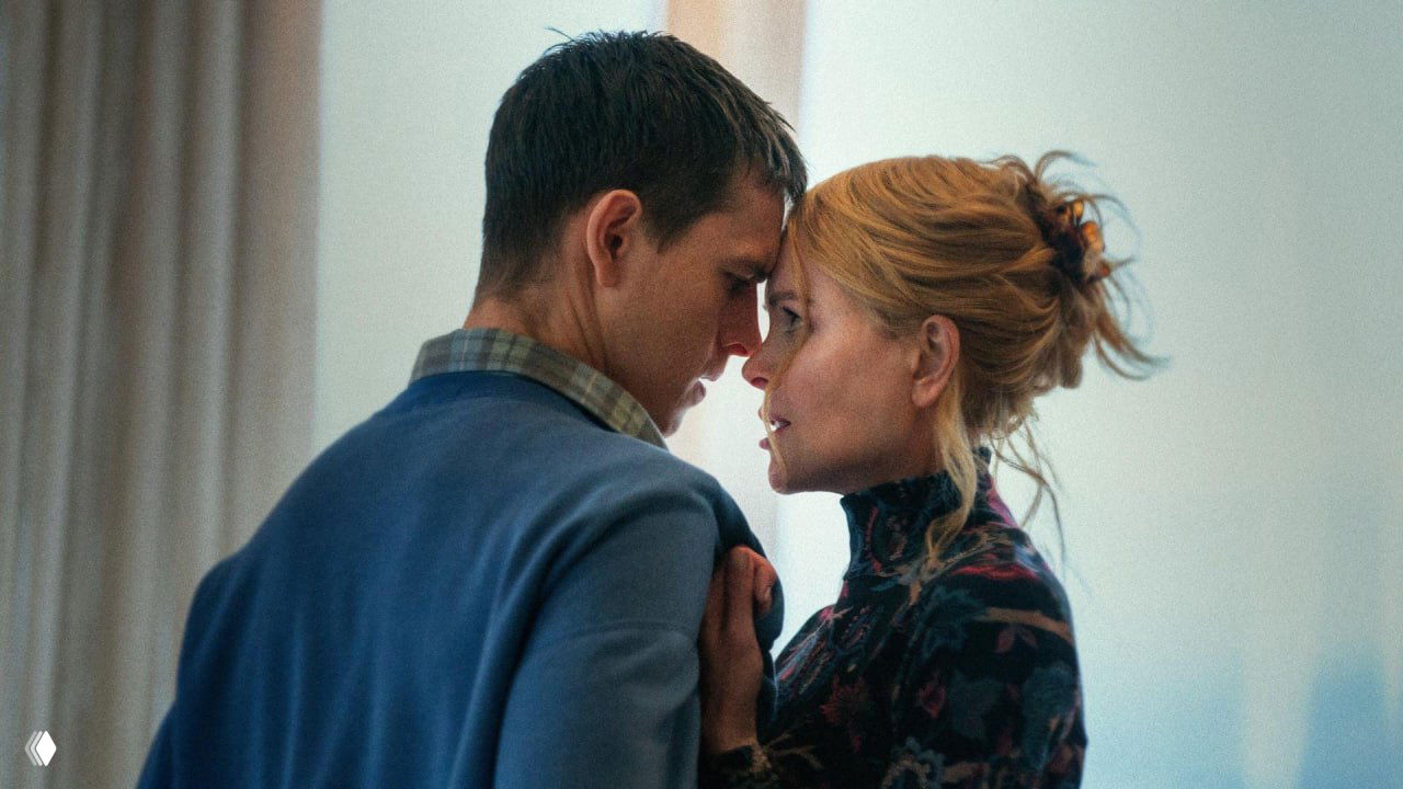 Мужчина и женщина в плотной близости, пристально смотрящие друг на друга — иллюстрация темы измен, эмоциональной и интимной напряжённости в паре.