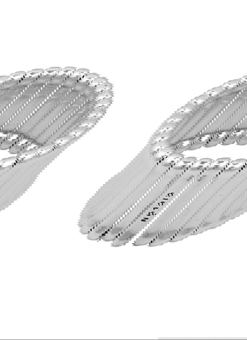 Рука модели в кадре, на запястье несколько браслетов Ciclon разного плетения; видно сочетание серебристых и розово-золотистых оттенков металла.