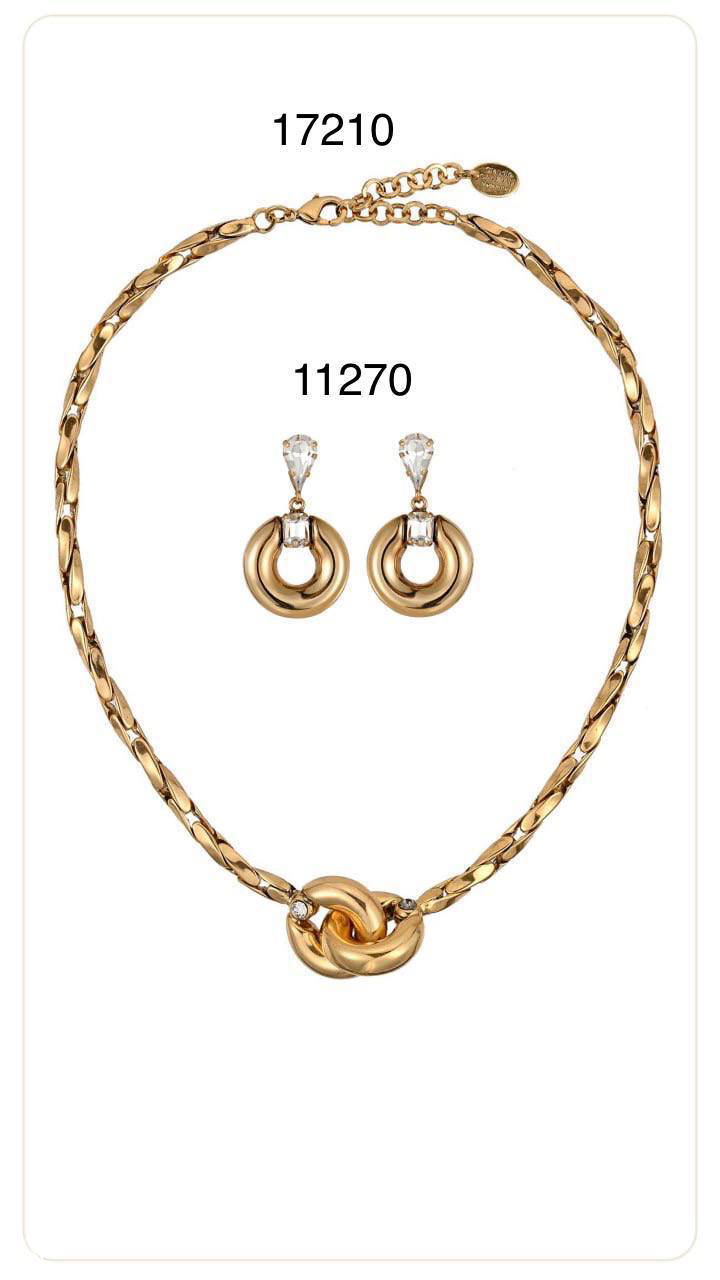 Элегантное колье с простой цепью и комплект серьг с круглыми деталями Claudio Canzian — минималистичный дизайн на белом фоне каталога.