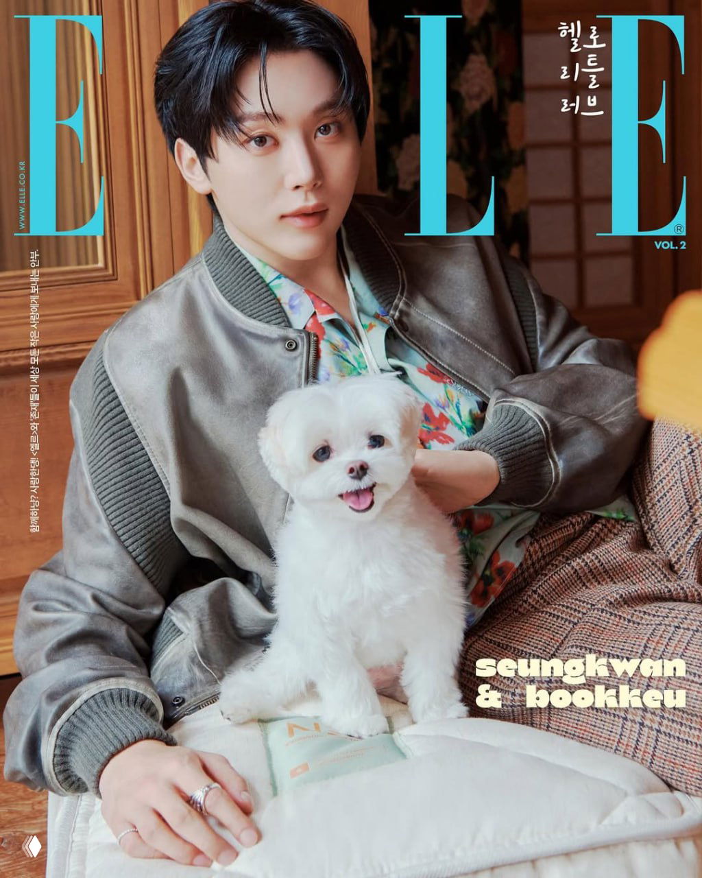 Обложка ELLE Korea: молодой артист сидит с маленькой белой собакой на коленях; светлая интерьерная обстановка и спокойное настроение.