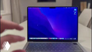 Кадр с MacBook и рукой перед экраном, демонстрация жестов управления устройством и браслета Mudra в тестовом ролике.