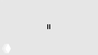 Минималистичное превью-видео с серым фоном и небольшим символом «II» в центре; постер/стоп-кадр, сопровождающий анонс функций ElevenLabs.