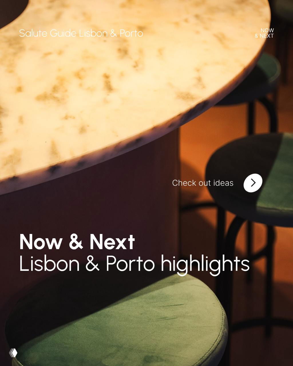 Close-up of a marble table edge and velvet bar stools in a warmly lit interior, stylish composition used for Salute Guide Lisbon & Porto highlights feature.
