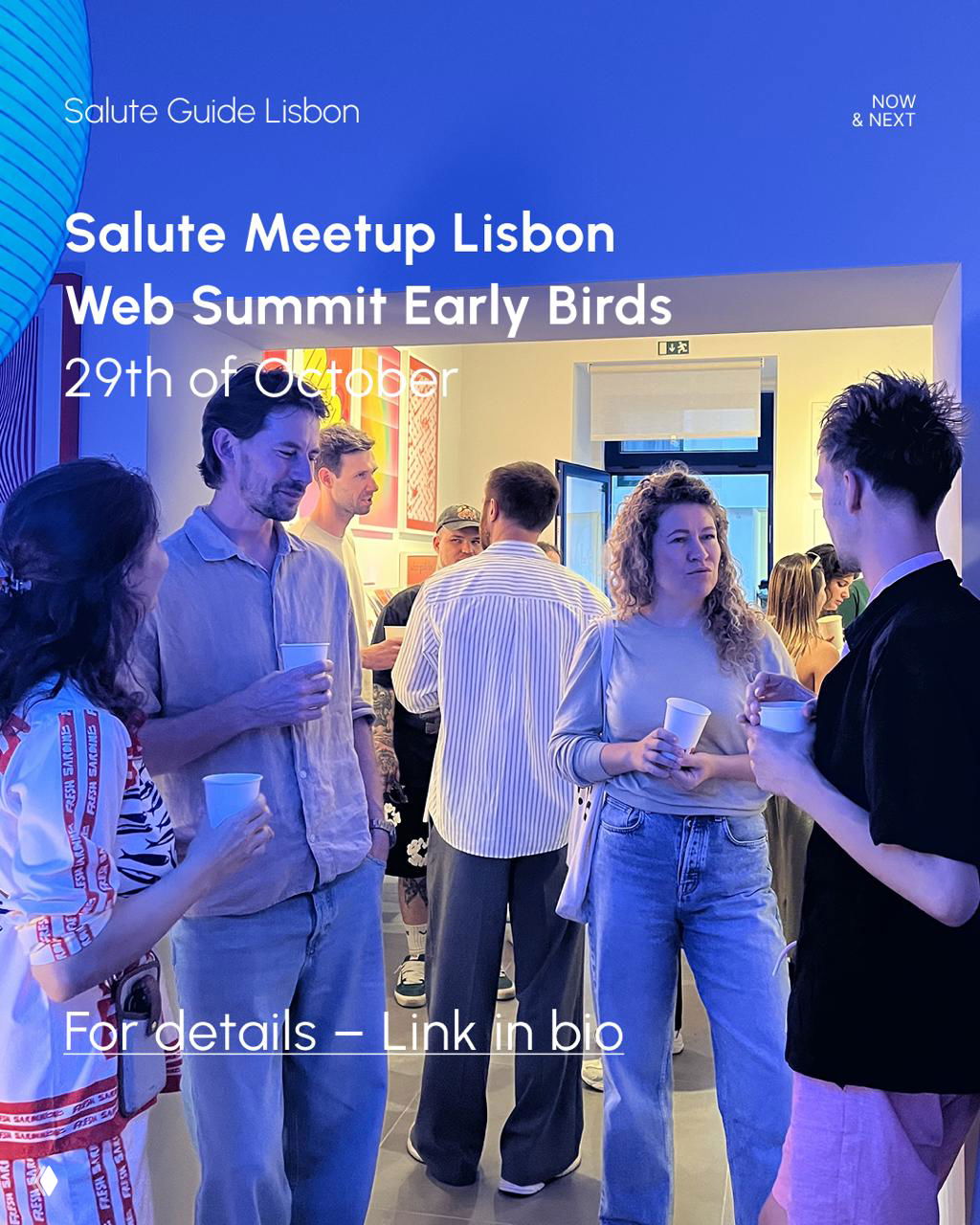Crowd photo of people socialising at an indoor Salute Meetup Lisbon event, showing attendees networking ahead of the Web Summit Early Birds gathering.
